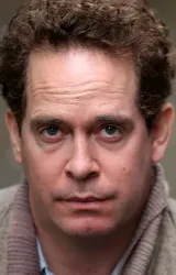 Том Холландер